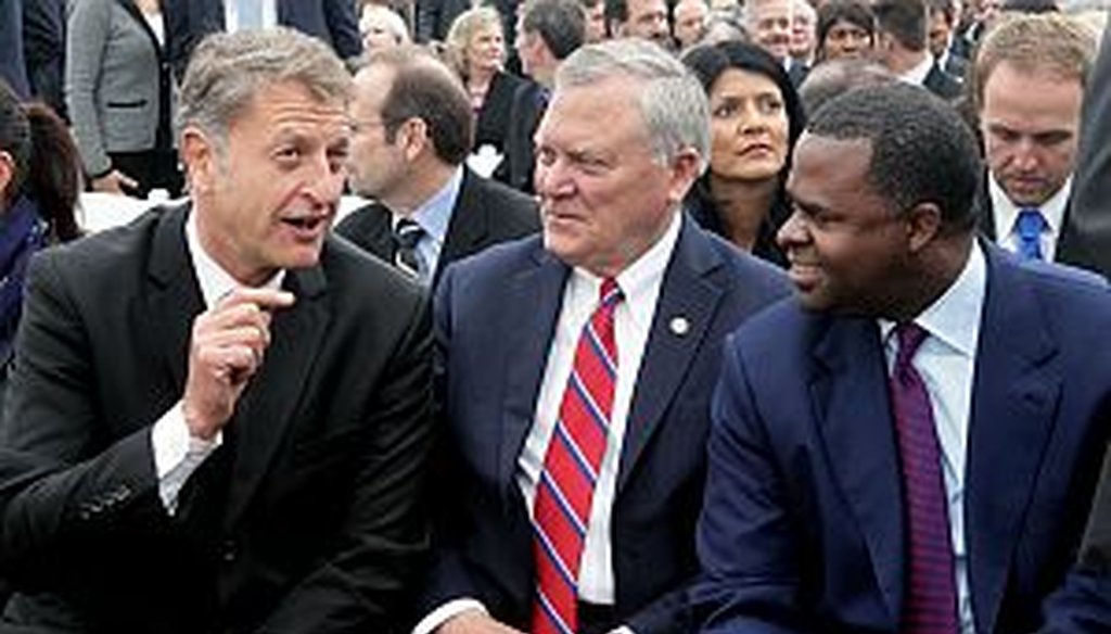 Gov. Nathan Deal and Atlanta Mayor Kasim Reed chat with Porsche Cars North America president and CEO before groundbreaking of  Porsche's North American headquarters near Hartfield-Jackson airport on Tuesday Nov. 27, 2012. (AJC photo/Phil Skinner)