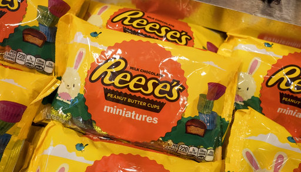  In this March 1, 2017, file photo, Reese's miniature peanut butter cups are displayed in Hershey's Times Square store in New York. Hershey's told the AP in September that a story claiming the company would discontinue the Reese's candy is false. (AP)