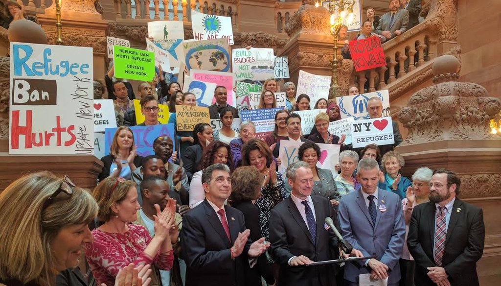 Members of the Assembly and advocates rally for state funding for refugee resettlement agencies in New York on Mar. 1, 2017.