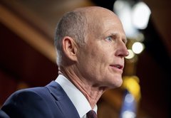 Sen. Rick Scott, carrying on a tradition, takes credit for infrastructure funding he opposed
