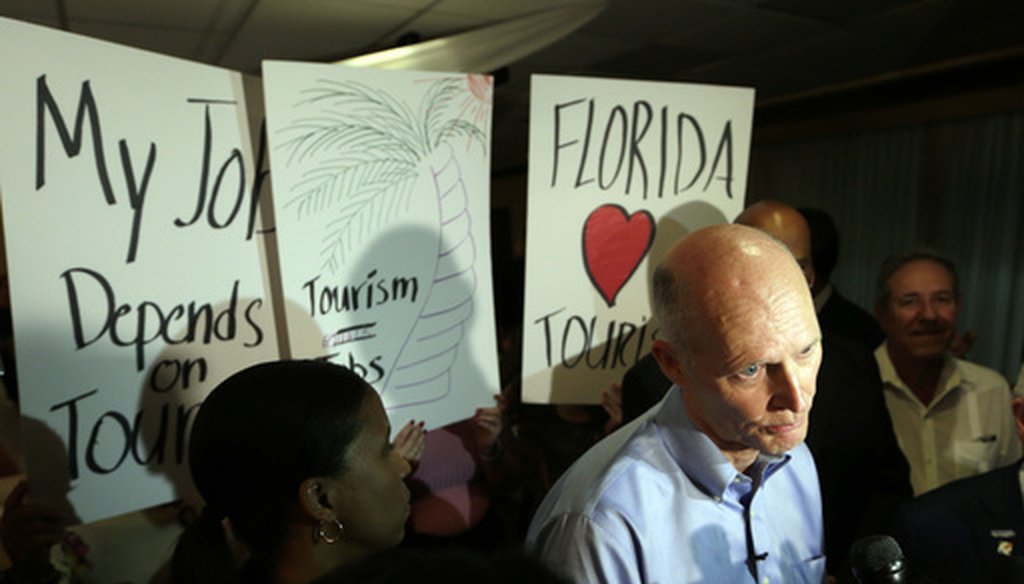 Florida Gov. Rick Scott speaks with the news media following a jobs roundtable about the economic impact of Visit Florida and Enterprise Florida, Thursday, March 2, 2017, in Hialeah, Fla. (AP)
