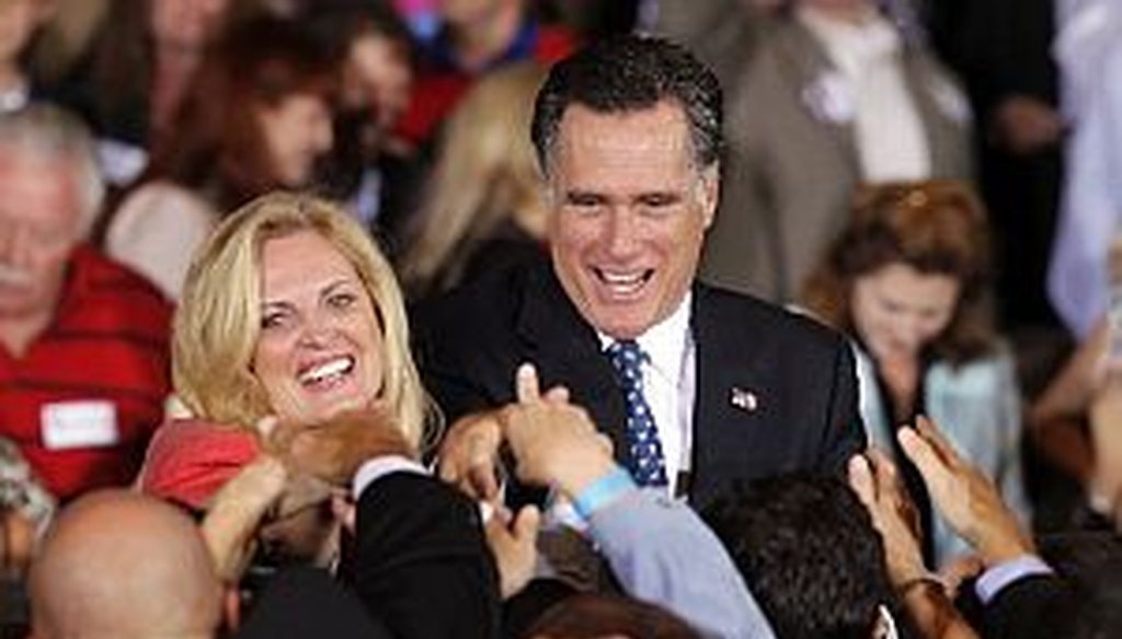 Ann and Mitt Romney greet supporters in Tampa on Tuesday after a Florida primary win.