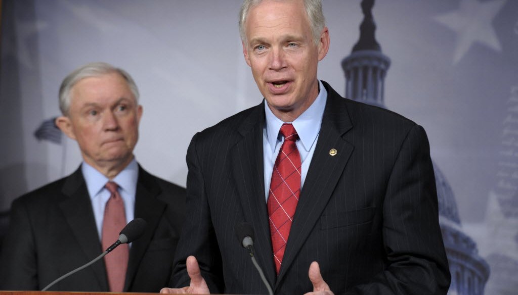 U.S. Sen. Ron Johnson (right), shown here with Sen. Jeff Sessions, has said Democratic senators Max Baucus and Harry Reid have called the implementation of Obamacare a "train wreck." So, what exactly did the two Obamacare supporters say? (AP photo)