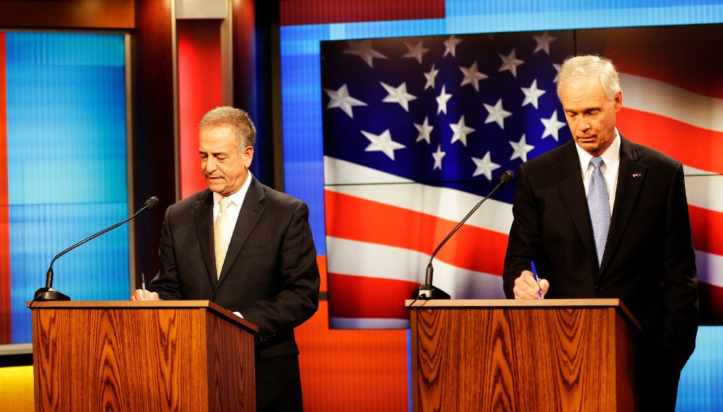 Democratic challenger Russ Feingold (left) and Republican U.S. Sen. Ron Johnson prepare for a debate in Green Bay, Wis., on Oct. 14, 2016. (Sarah Kloepping photo)