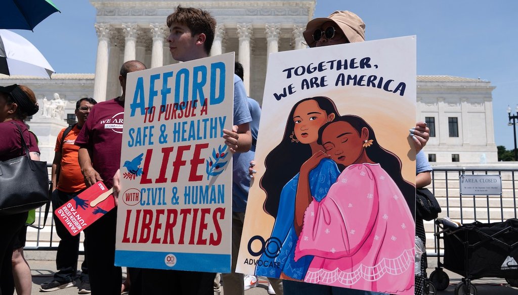 Activists celebrate the Supreme Court's ruling on birthright citizenship, outside of the Supreme Court on Capitol Hill, June 30, 2026, in Washington. (AP)