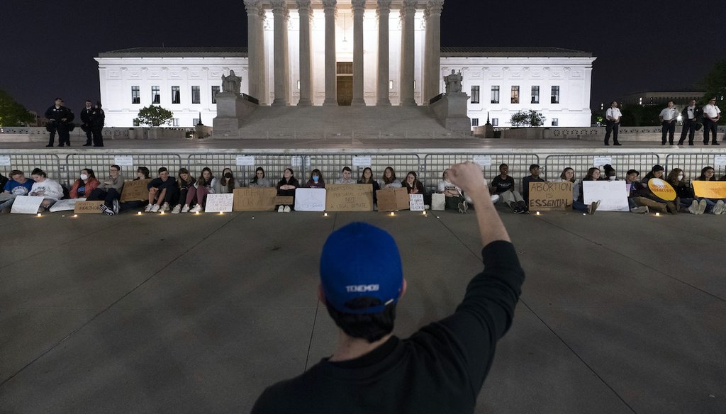 A crowd of people gather outside the Supreme Court early Tuesday, May 3, 2022, in Washington. A draft opinion suggests the U.S. Supreme Court could be poised to overturn the landmark 1973 Roe v. Wade case that legalized abortion nationwide. (AP)