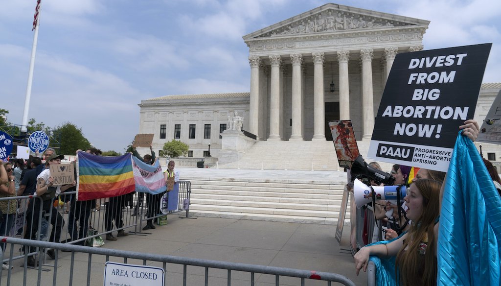 Demonstrators protest outside of the Supreme Court Tuesday, May 3, 2022 in Washington. (AP)