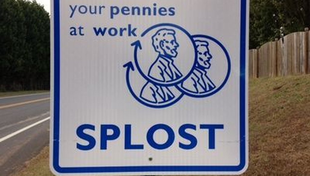 This sign marks a road project funded by Gwinnett County's Special Purpose Local Option Sales Tax. Photo credit: WSB.