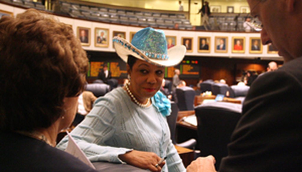 Frederica Wilson on the floor of the Florida Senate in one of her signature hats.