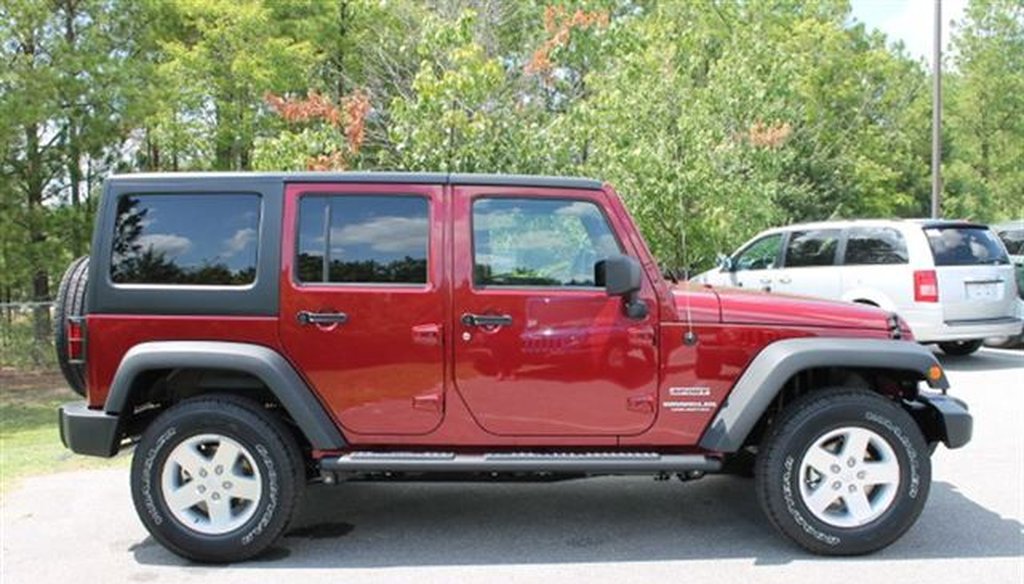 A 2012 Jeep Wrangler Unlimited Sport SUV. 