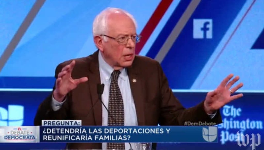 At the Democratic presidential debate in Miami, Vermont Sen. Bernie Sanders accused Hillary Clinton of supporting harsh policies toward immigrants. (screenshot)
