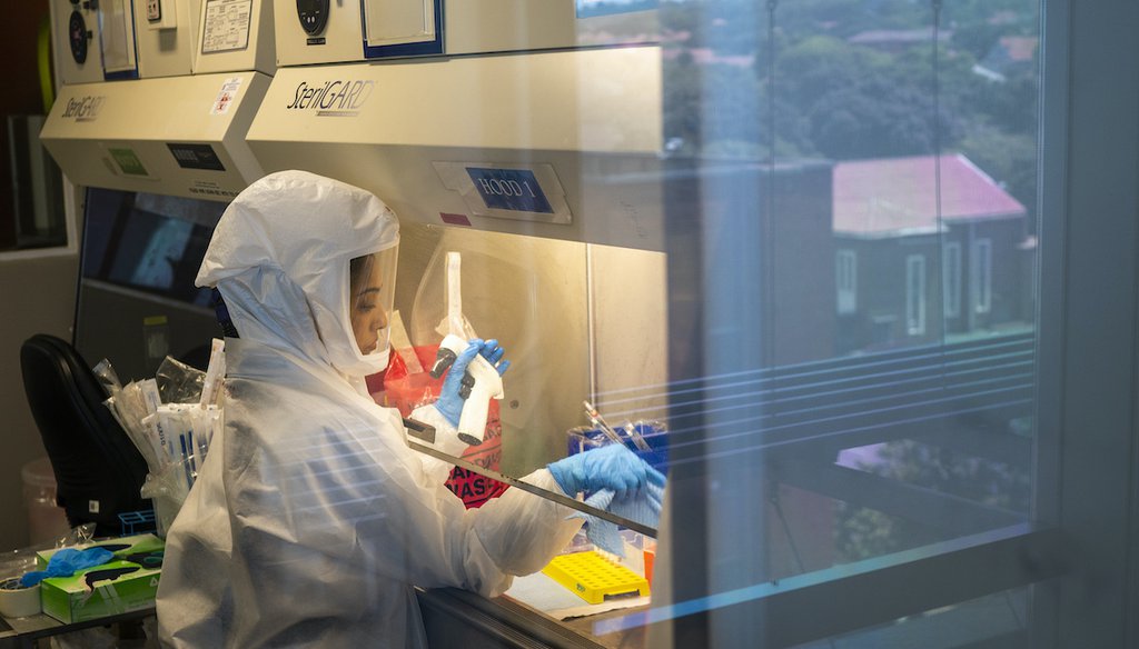 Scientists at the Africa Health Research Institute in Durban, South Africa, research and analyze the omicron variant of the COVID-19 virus on Dec. 15, 2021. (AP)
