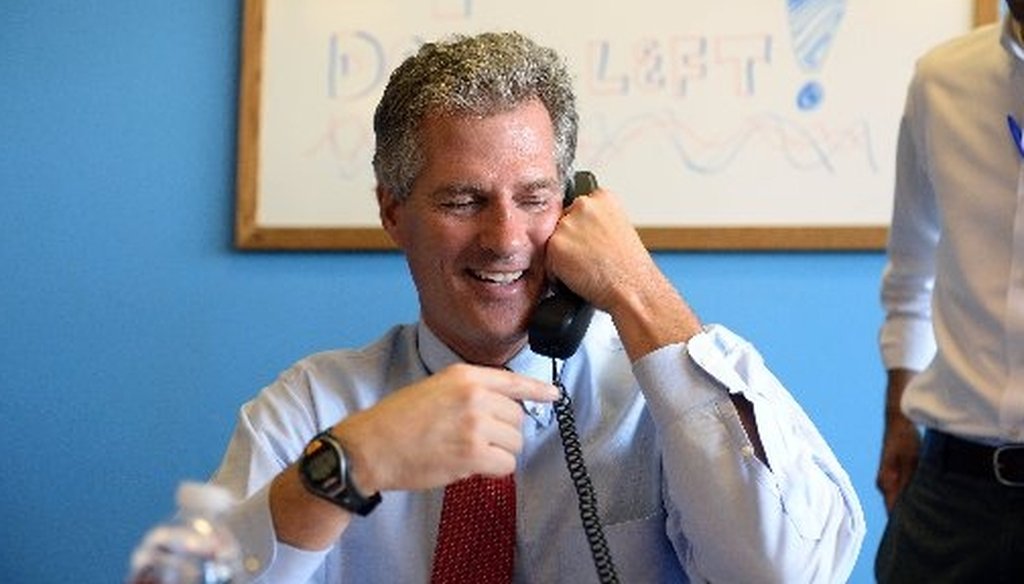 Scott Brown works the phone bank at the New Hampshire GOP's Salem headquarters on Sept. 17, 2014. He is challenging Democratic Sen. Jeanne Shaheen.