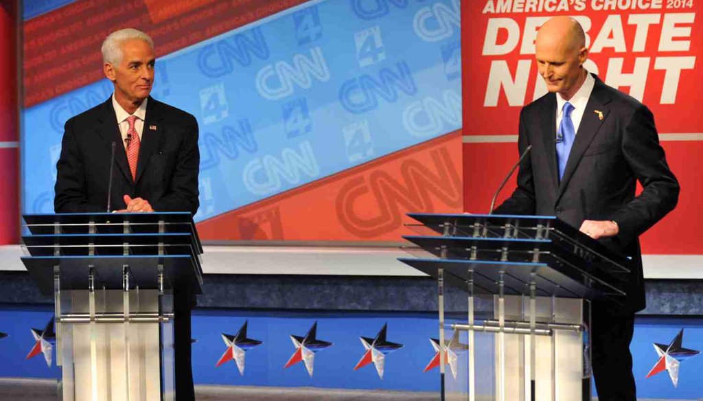 Former Gov. Charlie Crist and current Gov. Rick Scott debated in Jacksonville on Oct. 21, 2014.