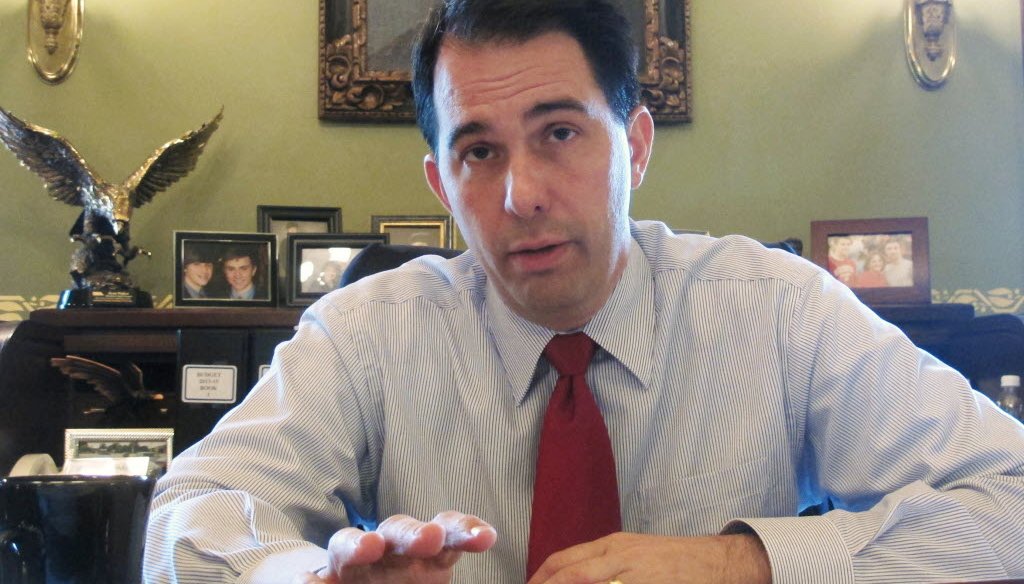 Gov. Scott Walker's position on abortion and a law he signed that restricts it are the subject of dueling TV ads in the 2014 Wisconsin gubernatorial election.