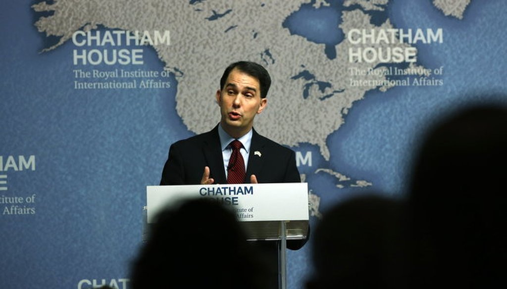Gov. Scott Walker, shown here speaking at Chatham House in London on Feb. 11, 2015, was a central figure in out most-clicked items that month. (AP photo)