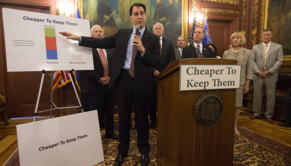 At a Capitol news conference on June 4, 2015, Gov. Scott Walker announced new details of a proposal to build a new arena for the Milwaukee Bucks and a slogan aimed at persuading lawmakers and taxpayers to support the deal. 