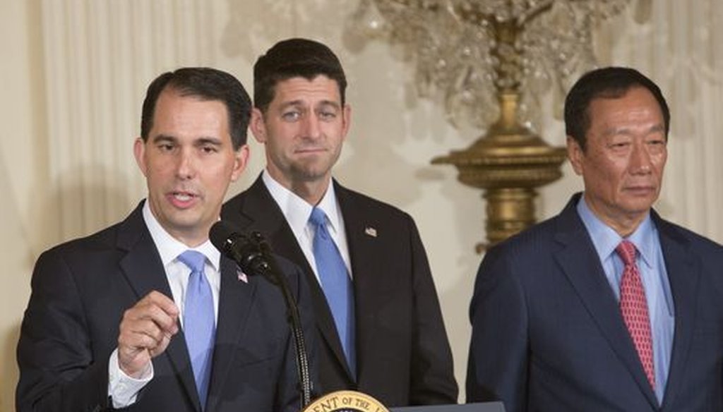 Wisconsin Gov. Scott Walker (from left), U.S. House Speaker Paul Ryan and Foxconn chairman Terry Gou appeared at the White House to announce Foxconn's plans to invest up to $10 billion to put a manufacturing plant in Wisconsin. (Chris Kleponis/CNP/TNS