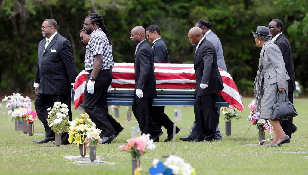 Pallbearers walk Walter Scott's casket to the gravesite for his burial service in Charleston, S.C. on Saturday, April 11, 2015. Scott's death at the hands of a North Charleston, S.C., police officer reignited calls for more police accountability. (AP)