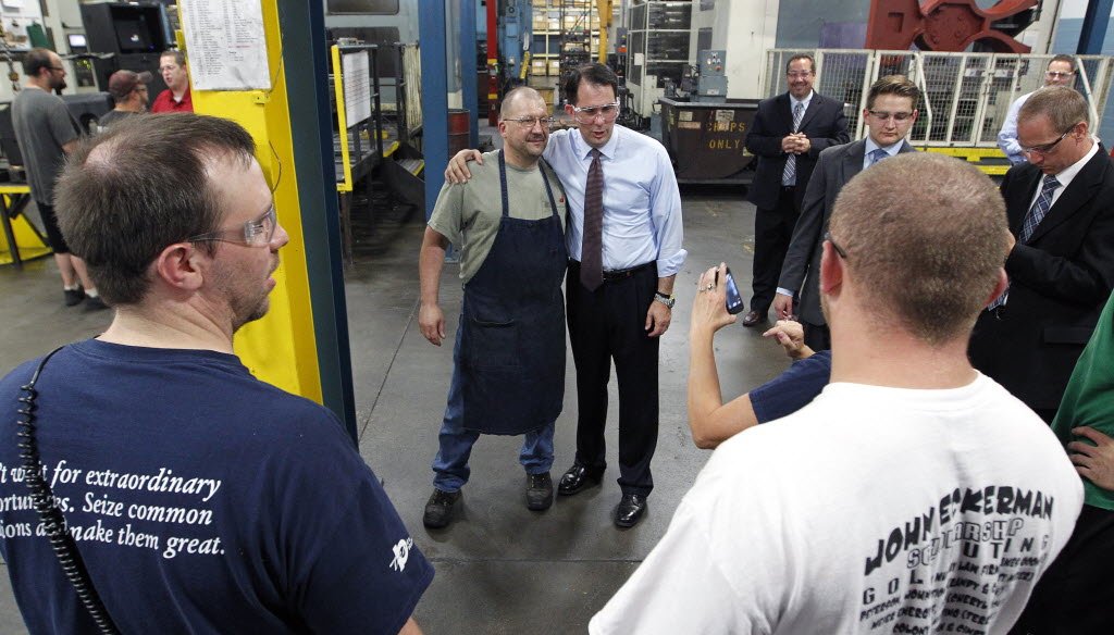 Gov. Scott Walker, shown here visiting a plant in Platteville, has touted his jobs record. (Milwaukee Journal Sentinel photo)