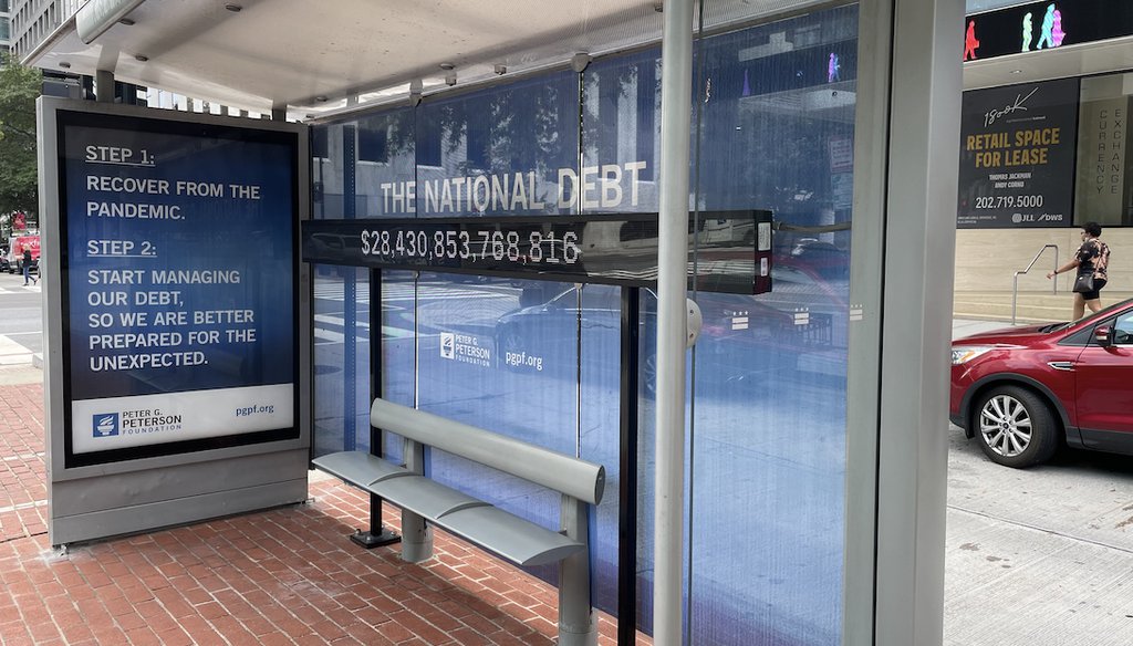 A scoreboard tracking the national debt in downtown Washington, D.C., on Oct. 5, 2021. (Louis Jacobson/PolitiFact)