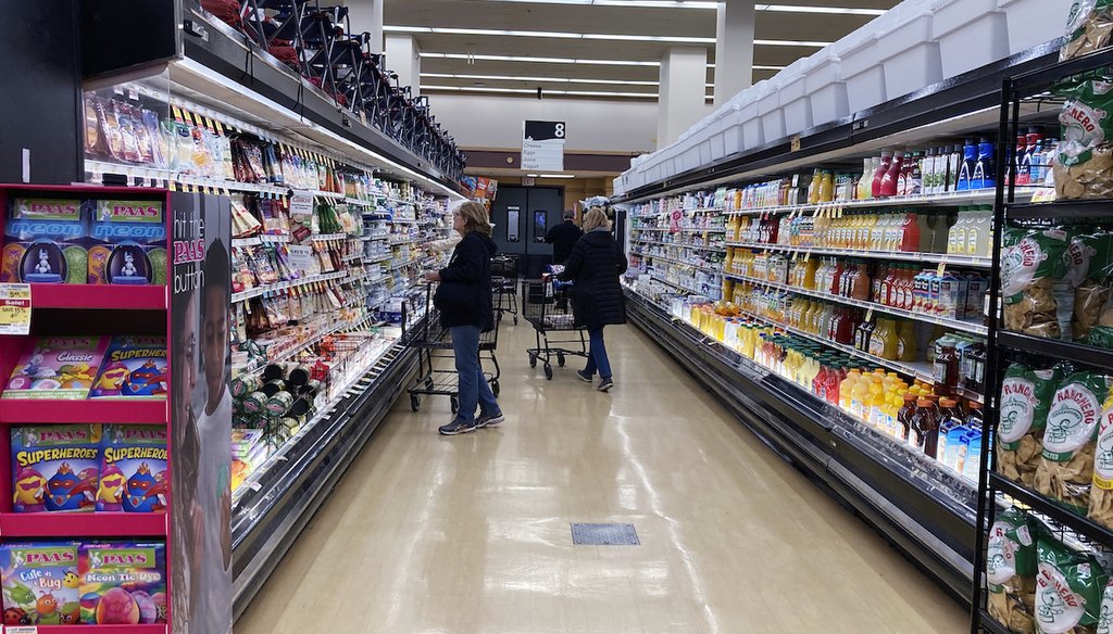 Customers shop at a grocery store in Mount Prospect, Ill. Food inflation is taking a toll on family budgets. (AP)
