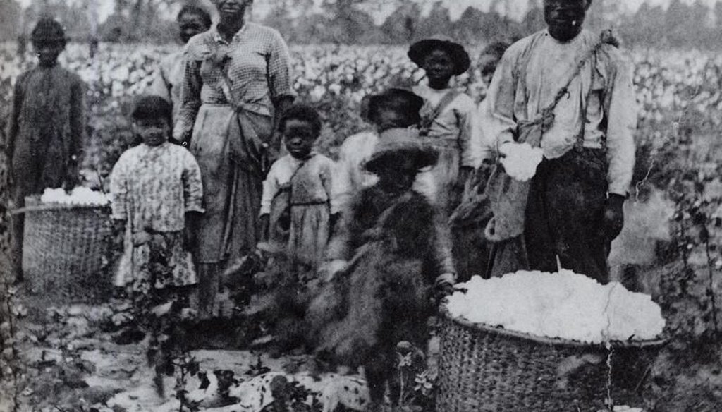 Family of enslaved Black Americans in a field in Georgia, circa 1850. (Public domain)