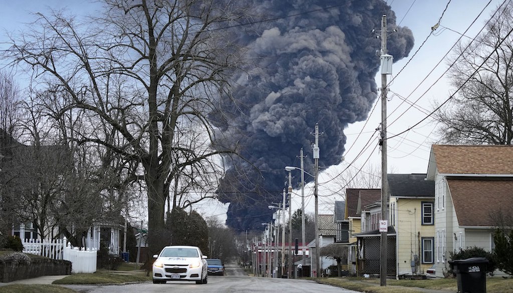 A black plume rises over East Palestine, Ohio, as a result of a controlled detonation of a portion of the derailed Norfolk Southern trains Monday, Feb. 6, 2023. (AP)