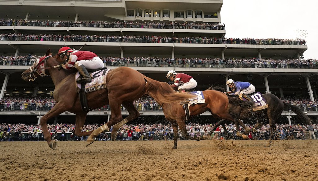 Rich Strike (21), with Sonny Leon aboard, leads Epicenter (3), and Zandon (10), as Rich Strike wins the 148th running of the Kentucky Derby at Churchill Downs on May 7, 2022. (AP)