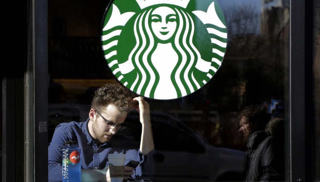 The ubiquitous coffee retailer Starbucks buys about 3 percent of the world's coffee beans. (Associated Press)