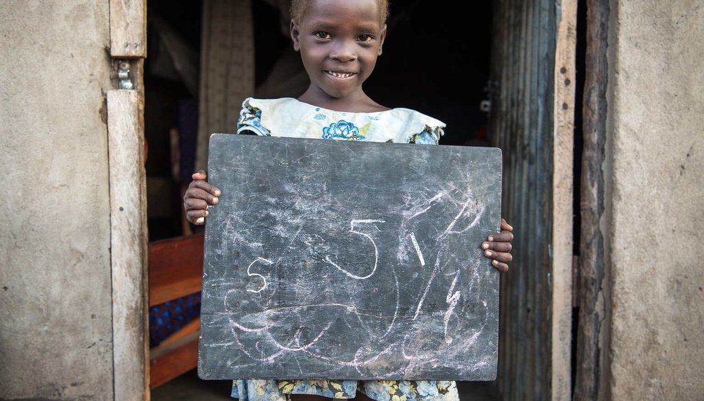 Susan Andua, 5, outside her mother Florence’s house in Nimule, South Sudan.(UNICEF/UNI203956/Everett)
