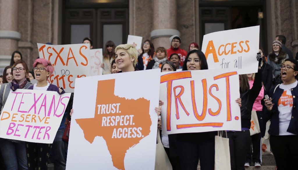 Protesters outside the Texas state house in 2015 voiced their disapproval of abortion restrictions that critics predicted would drive more women to risk self-abortions. (AP Photo).