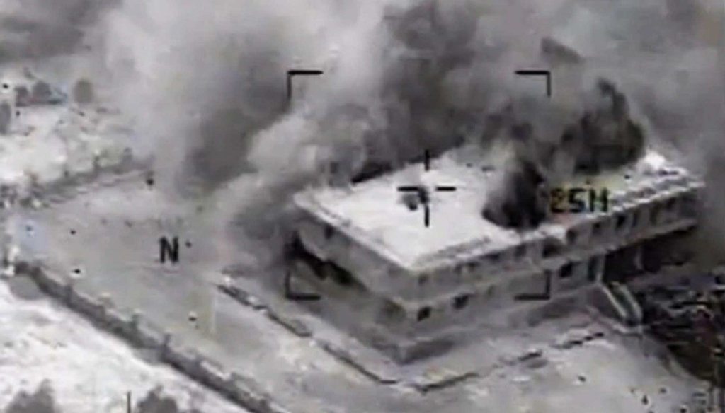 A structure in Tall Al Qitar, Syria moments after a U.S. airstrike Sept. 23. U.S. forces, with some Arab participation, made more than 200 airstrikes against roughly a dozen militant targets in Syria. (AP Photo/US Central Command)