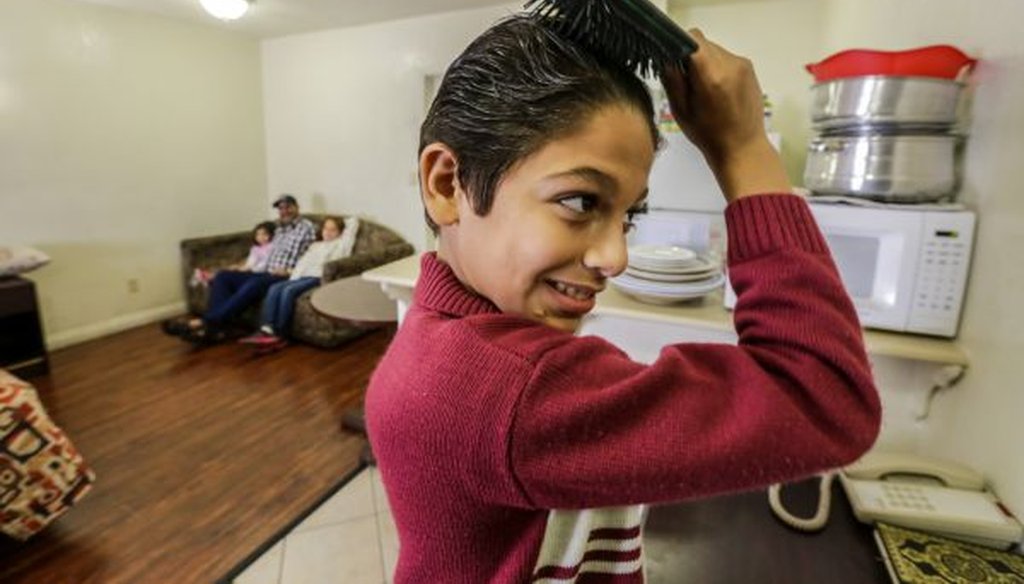Eleven-year-old Omran Wawieh, a refugee from Syria, is staying with parents and siblings at a motel in Pomona, Calif., on Nov. 17, 2015. (Irfan Khan/Los Angeles Times/TNS)