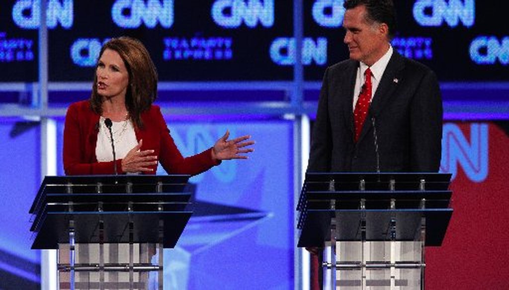 Rep. Michele Bachmann and Mitt Romney at Monday's CNN/Tea Party Express debate in Tampa.
