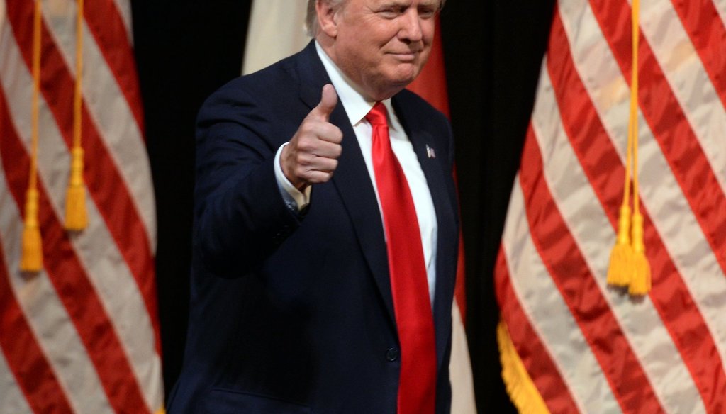 Donald Trump flashes a thumbs up to supporters at his speech in Raleigh, N.C., on July 5, 2016