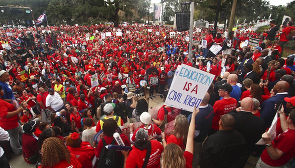 Teachers and supporters march Monday, Jan. 13, 2020, during the Florida Education Association's "Take on Tallahassee" rally at the Old Capitol in Tallahassee, Fla. (AP)