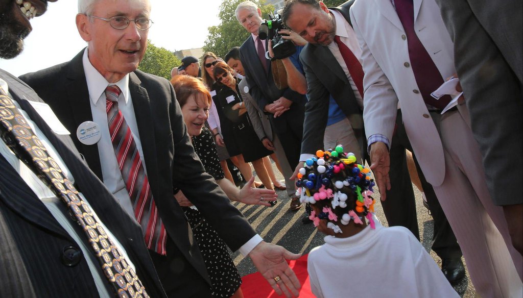 State superintendent of schools Tony Evers (at left) welcomes students returning to school. Evers, a Democrat, is a candidate for governor in 2018. (Milwaukee Journal Sentinel)