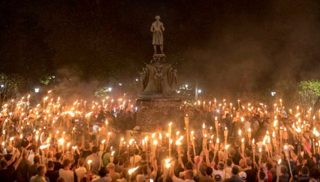 Torch-bearing white nationalists rally around a statue of Thomas Jefferson on the University of Virginia campus in Charlottesville, Va., on Aug. 11, 2017. (Edu Bayer/New York Times) 