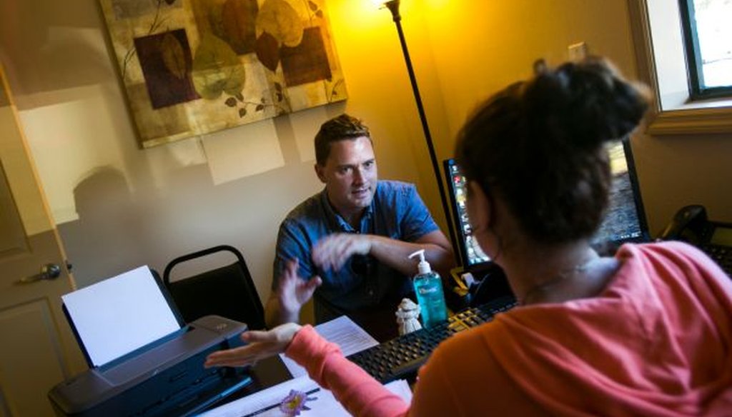 Brian Donnelly, 30, talks with admissions manager Annie Digirolamo during his pre-intake session at a new drug treatment clinic in Spring Hill, Fla., on Oct. 1, 2013. (Will Vragovic/Tampa Bay Times)