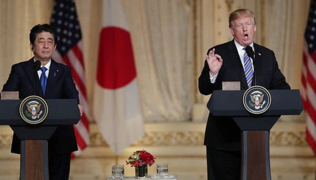 Japanese Prime Minister Shinzo Abe, left, listens as President Donald Trump, right, speaks during a news conference at Trump's Mar-a-Lago club on April 18, 2018. (AP/Lynne Sladky)