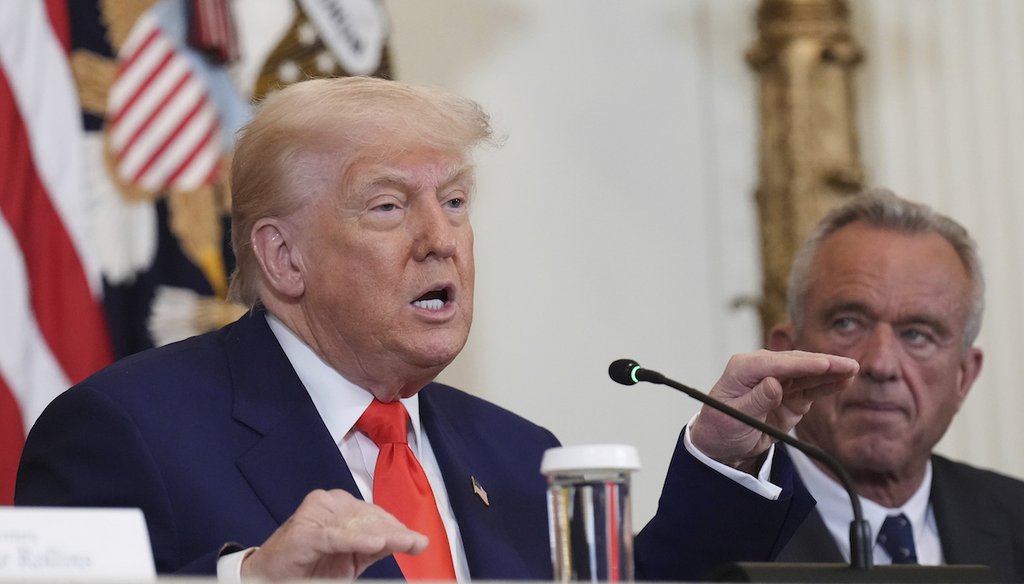 President Donald Trump, left, speaks as Health and Human Services Secretary Robert F. Kennedy Jr. listens during a Make America Healthy Again (MAHA) Commission Event in the East Room of the White House, May 22, 2025, in Washington.