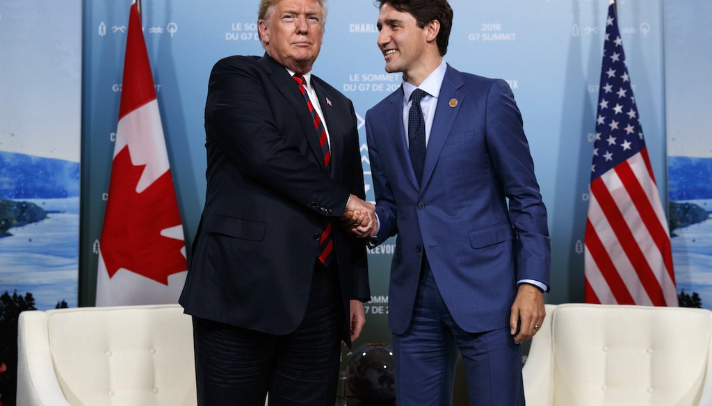 President Donald Trump shakes hands with Canadian Prime Minister Justin Trudeau during the G-7 summit on June 8, 2018, in Charlevoix, Canada. (AP)