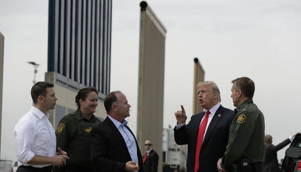 President Donald Trump reviews border wall prototypes, Tuesday, March 13, 2018, in San Diego. Evan Vucci / AP Photo 