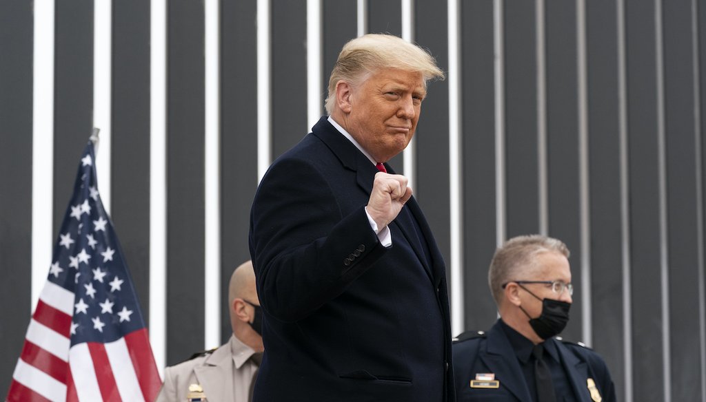 President Donald Trump pumps his fist as he tours a section of the U.S.-Mexico border wall, Tuesday, Jan. 12, 2021, in Alamo, Texas. (AP)