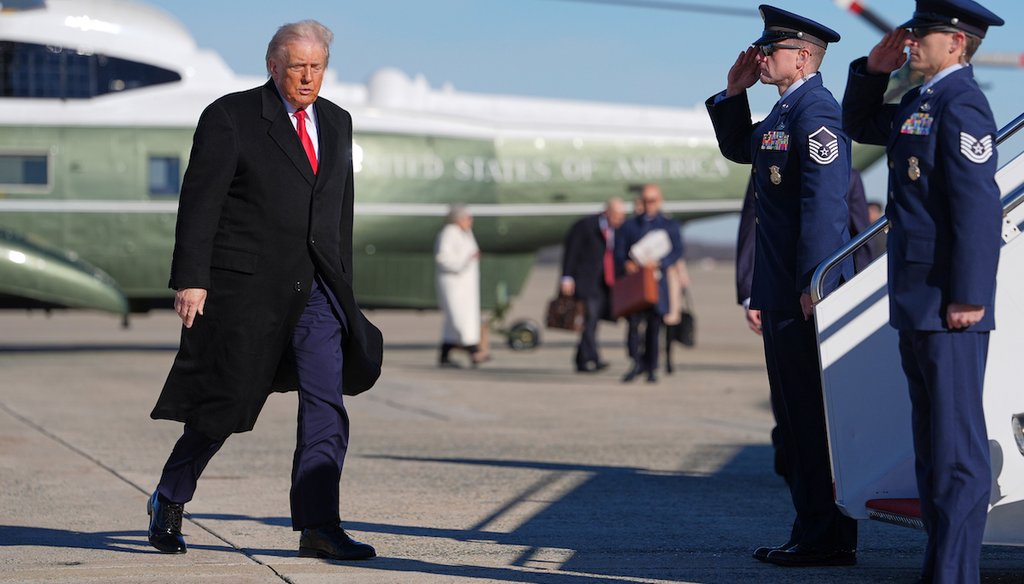 President Donald Trump boards Air Force One for a trip to Detroit, Tuesday, Jan. 13, 2026, in Joint Base Andrews, Md. (AP)