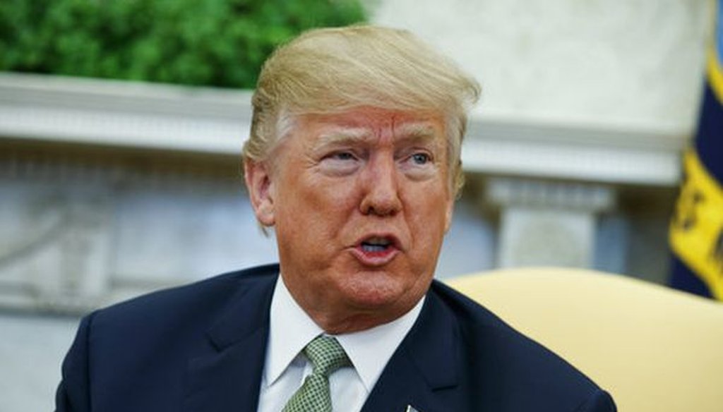 President Donald Trump talks with reporters during a meeting in the Oval Office on March 15, 2018. (AP/Evan Vucci, File)