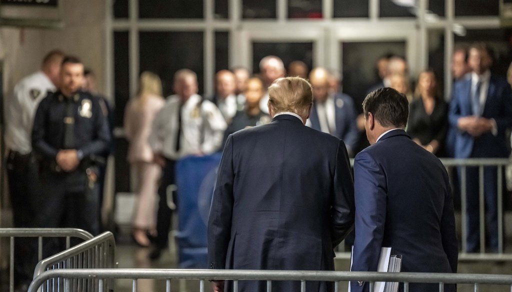 Former President Donald Trump, flanked by attorney Todd Blanche, prepares to leave the courthouse May 30, 2024, following the conclusion of his hush money trial in New York. (AP)
