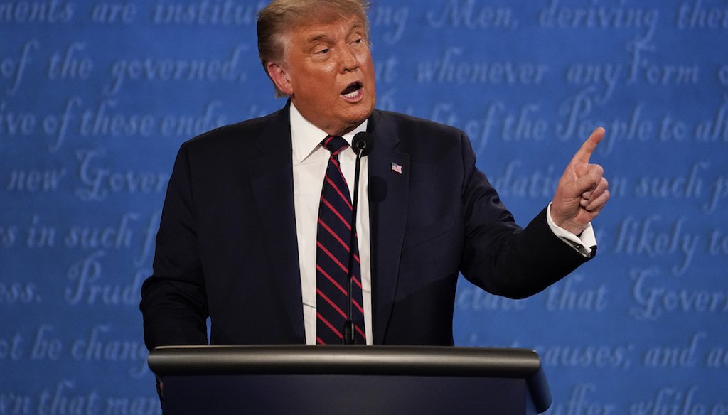 President Donald Trump gestures while speaking during the first presidential debate in Cleveland, Ohio. (AP Photo/Julio Cortez)