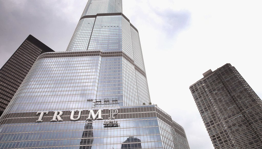 Workers install the final letter for a giant TRUMP sign on the outside of the Trump Tower on June 12, 2014 in Chicago, Illinois. Some argue Republican presidential candidate Donald Trump could have made more money investing in the stock market. (Getty Ima